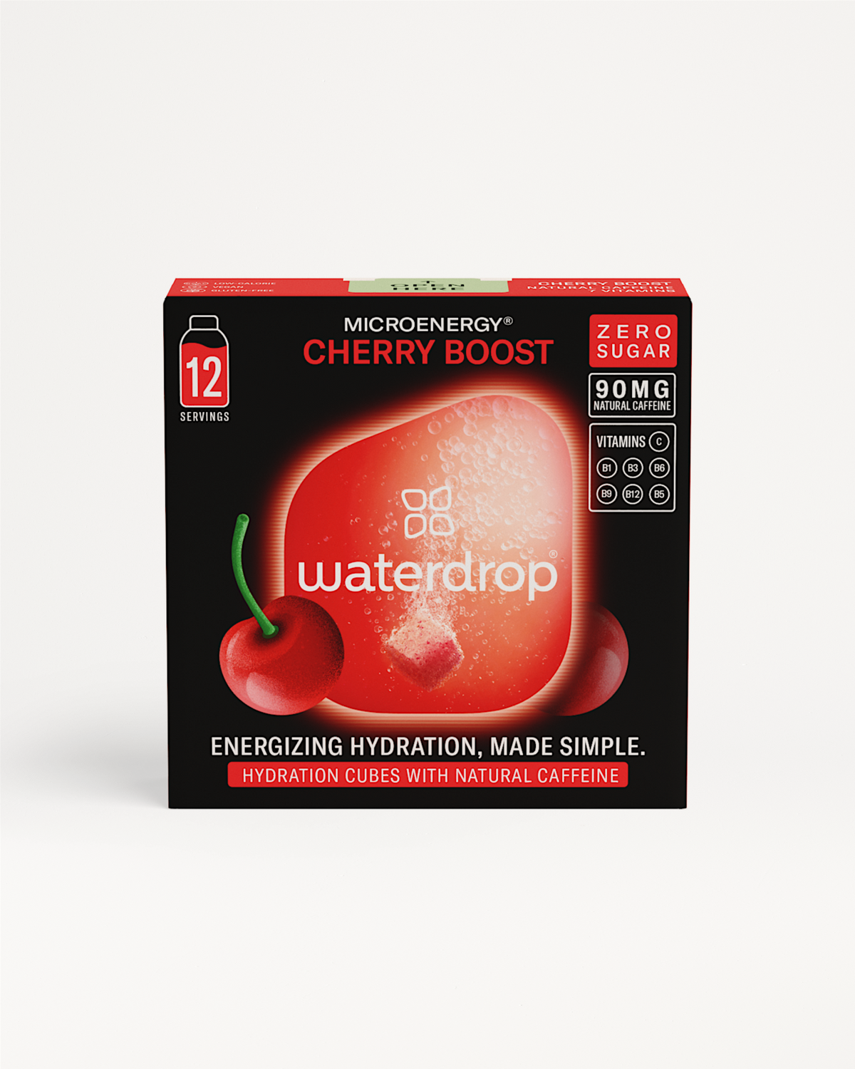 Close-up van een doos CHERRY BOOST energiedrankjes van waterdrop®, met een verfrissende en suikervrije zure kersensmaak, geïnspireerd door zure snoepjes en verrijkt met guarana.