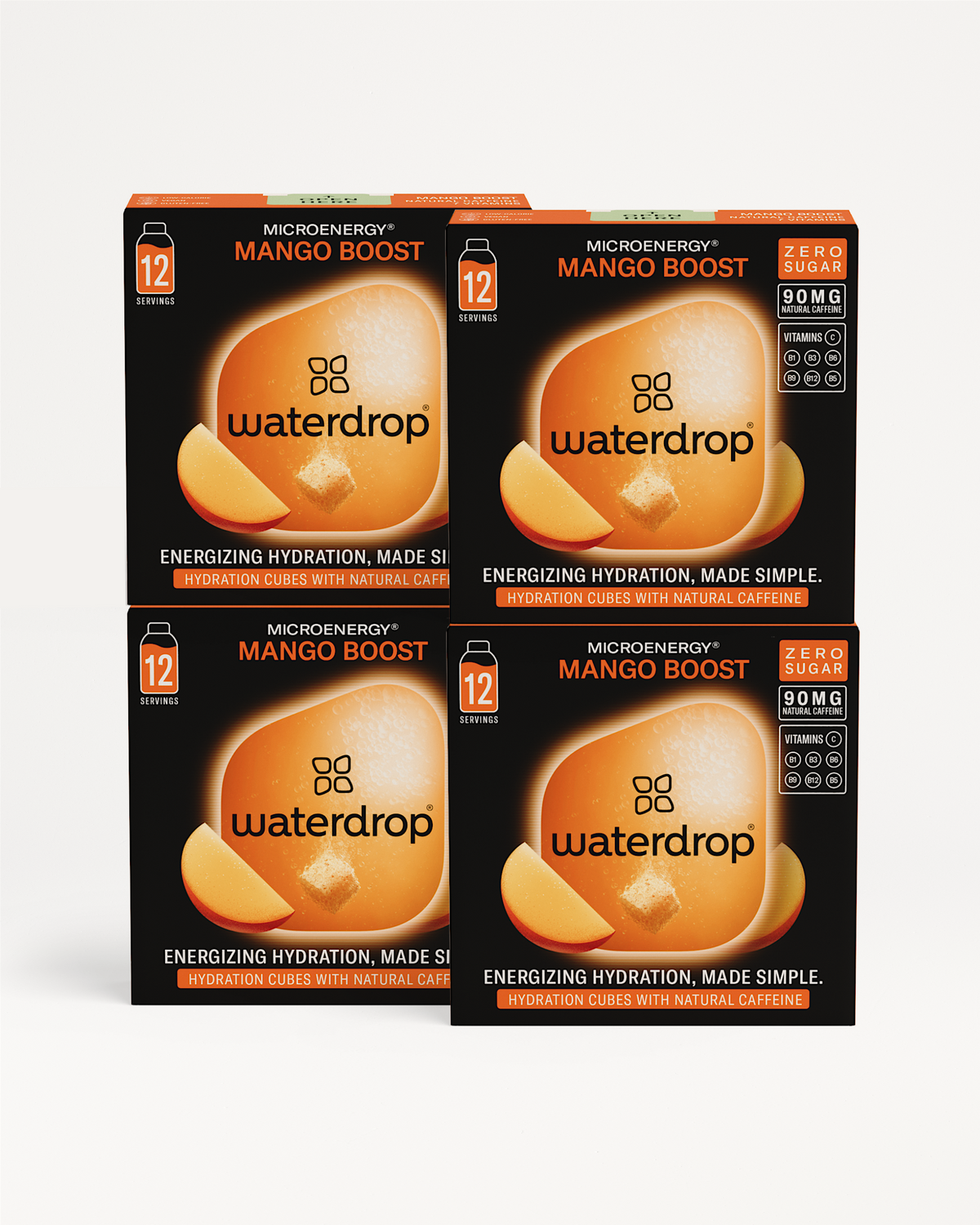 Vier doosjes van waterdrop's Microenergy 3+1 “Mango Boost” hydratatieblokjes met 12 porties per doos. Deze mango-smaakblokjes bevatten 90 mg natuurlijke cafeïne, zijn suikervrij en verrijkt met B-vitaminen en vitamine C.