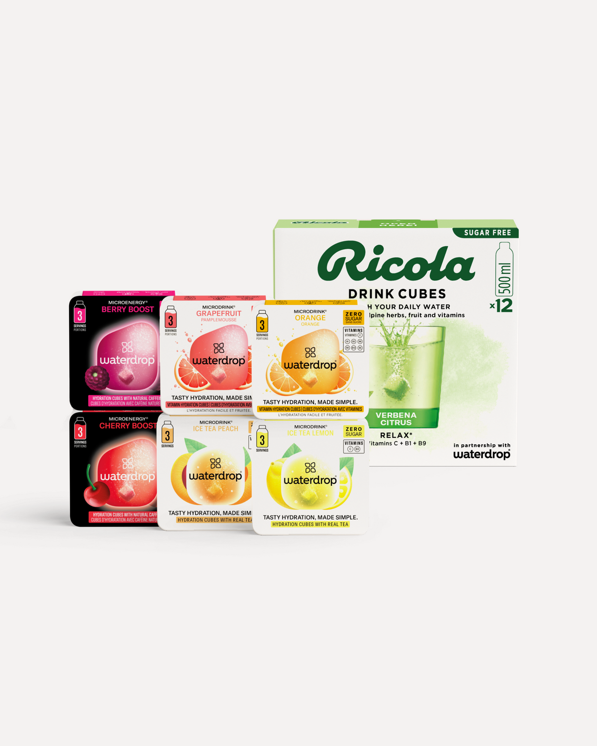 Waterdrop® x Ricola-Proefpakket toont kleine doosjes Waterdrop hydratatieblokjes en een grotere Ricola Drink Cubes doos. Inclusief zes Waterdrop smaken en suikervrije Ricola Verbena Citrus smaak voor 12 drankjes.