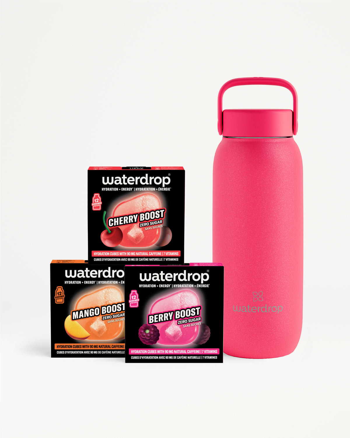 Roze herbruikbare waterfles naast drie kleine zwarte Waterdrop-doosjes.