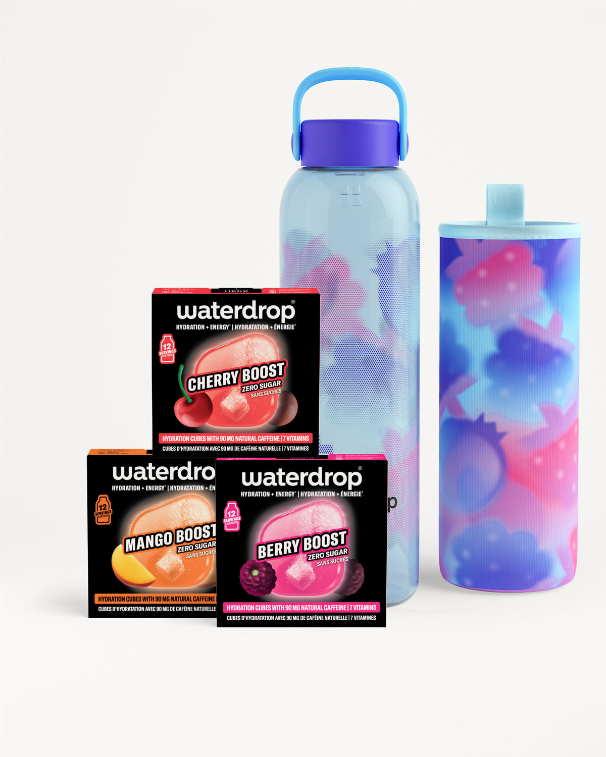 Drie smaakdozen naast een lichtblauwe verloopfles en een bijpassende beker.