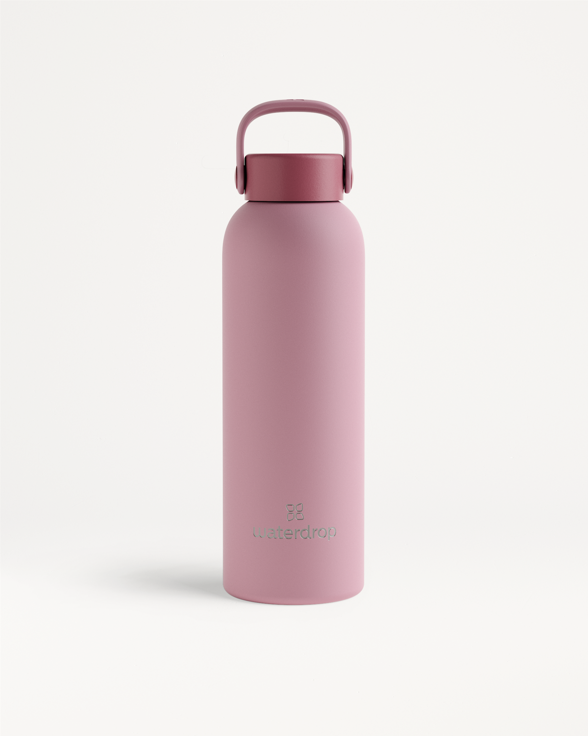 Matte-pink RVS Drinkfles met flessendop en draaglus, van waterdrop. Dubbelwandig voor 600 ml, houdt dranken 24 uur koud of 12 uur warm. Merknaam bij de basis zichtbaar.