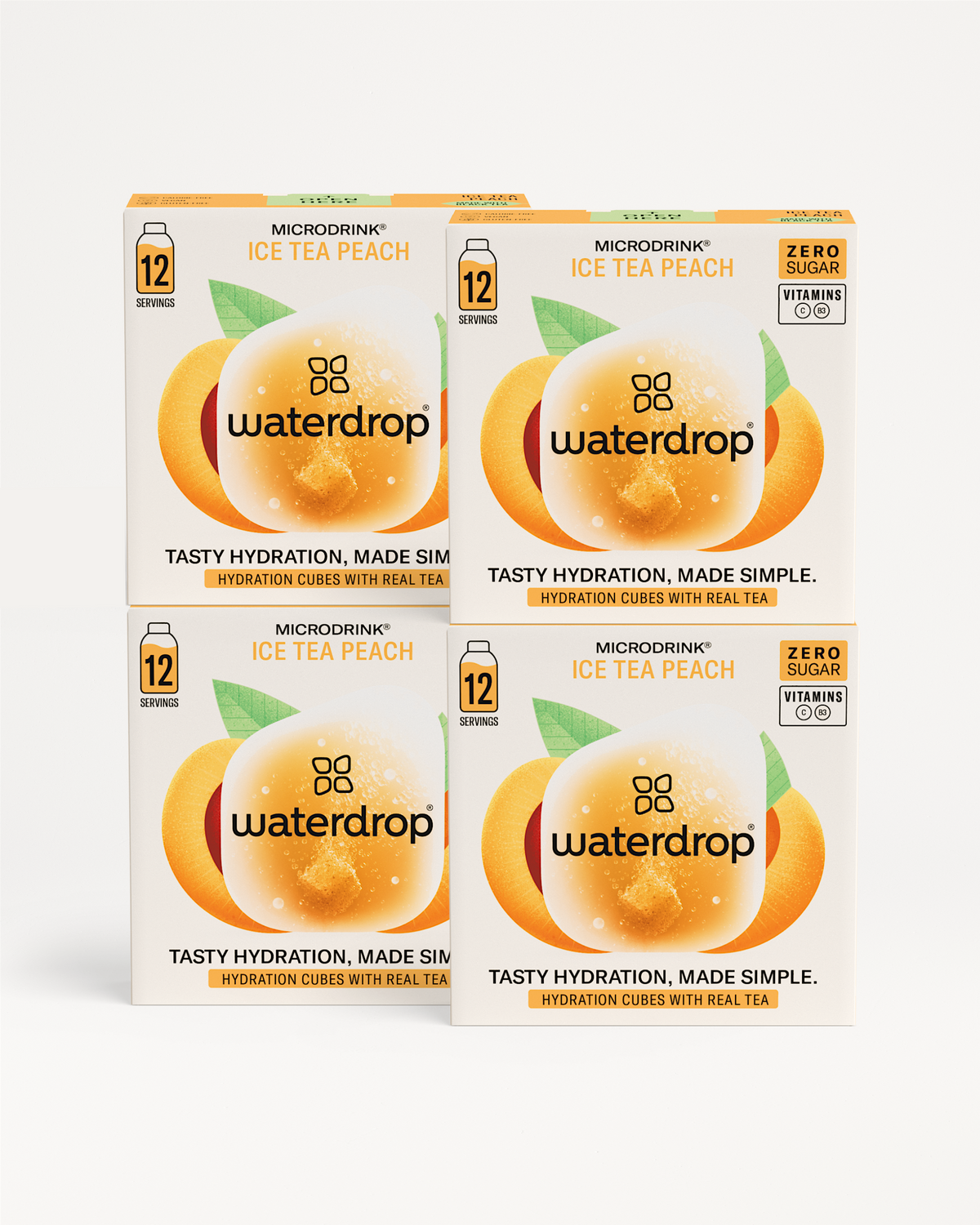 Vier gestapelde dozen van waterdrop®’s ICE TEA 3+1 Microdrink® met 48 suikervrije perziksmaak-ijs-thee-cubes, verrijkt met echte thee en vitamines C en B3. Tijdelijke aanbieding: neem vier, betaal er drie.