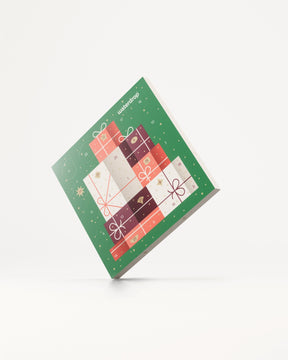 Kleine adventskalender van Waterdrop met 25 genummerde cadeau panelen, elk een verrassende traktatie onthullend. Perfect voor een feestelijke december, elk vakje biedt een fruitige verrassing.