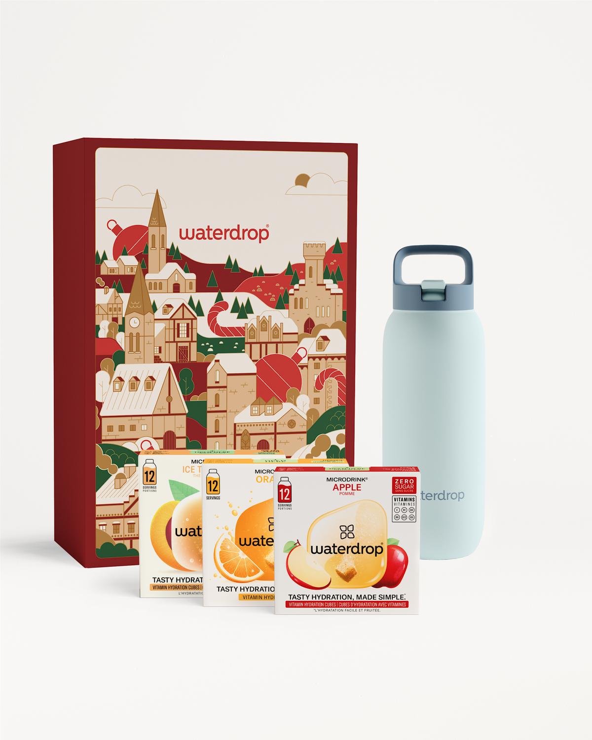Cadeauset met All-Purpose fles met rietje: waterdrop® kerstcadeau met geïllustreerde geschenkdoos, drie smaken Microdrink cubes (Apple, Orange, Ice-Tea Peach) en een poederblauwe geïsoleerde fles.
