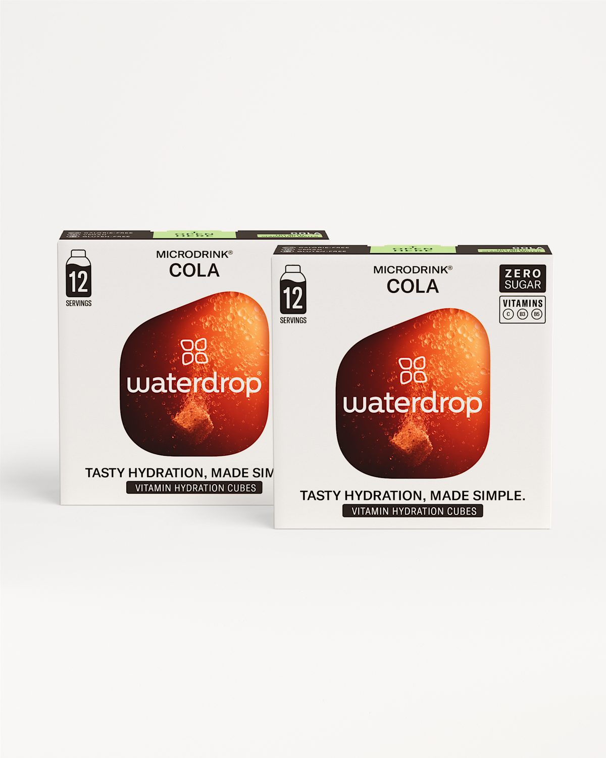 Fizzy Refreshment Twin-pack: Twee dozen waterdrop Microdrink Cola met 12 porties. Zero-suiker, bevat vitamines C, B₃, B₅. Slogan: Tasty hydration, made simple. Bespaar met deze suikervrije, frisdrank-geïnspireerde smaken.