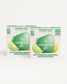 Twee overlappende dozen van de Sprankelend Citrus Dubbelpack tonen de Waterdrop “Microdrink® Focus” Lemon-Lime hydratatieblokjes. Elke doos bevat 12 suikervrije porties met de boodschap Tasty hydration, made simple.
