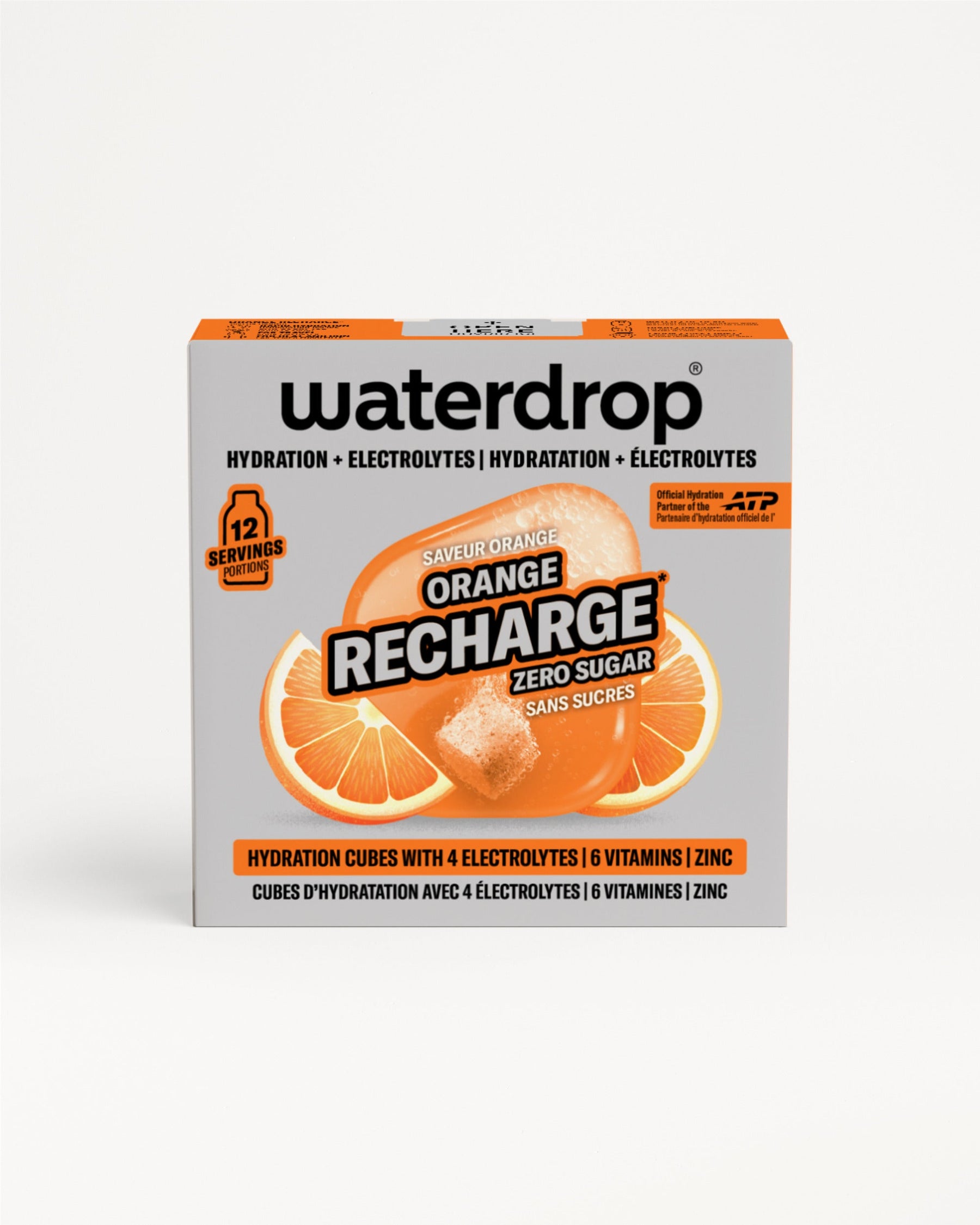 ORANGE RECHARGE retailbox met 12 suikervrije hydratatieblokjes per doos, met sinaasappelsmaak, vier elektrolyten, zes vitamines, en zink. Bilinguale verpakking met ATP-partnerlogo, sinaasappelschijfjes en oplossend blokje zichtbaar.
