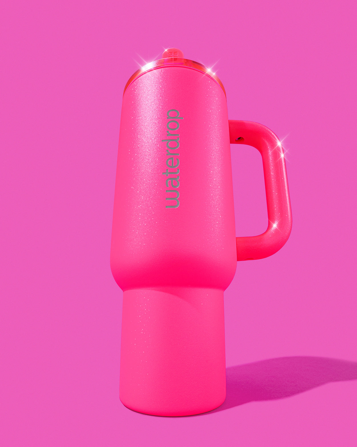 Neonroze Explorer Thermo Drinkbeker met ingebouwde handgreep en klaprietje, ontworpen voor optimale hydratatie. Dubbelwandige constructie biedt extra verkoeling, perfect voor onderweg. 