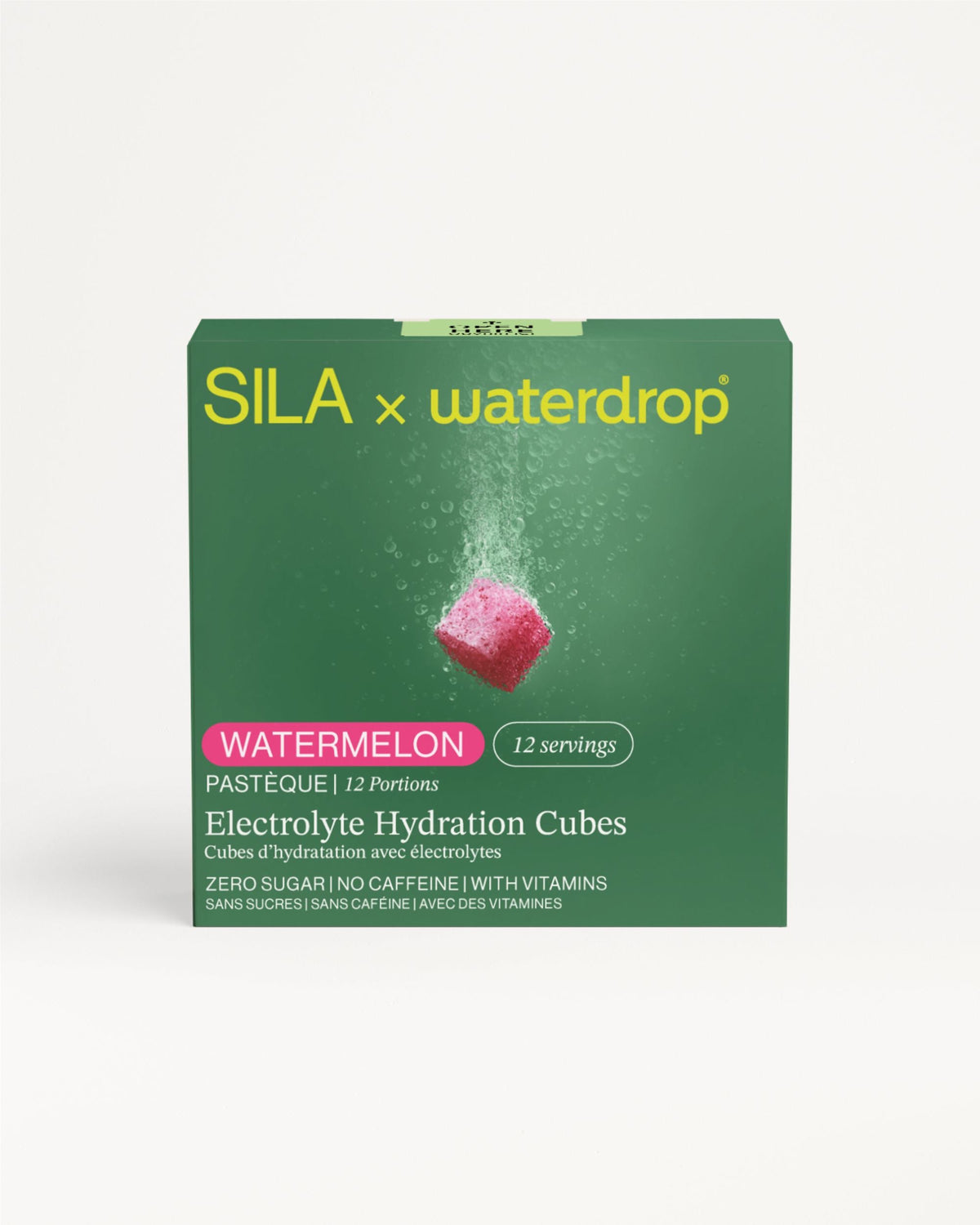 SILA Watermelon verpakking voor elektrolytenhydratatieblokjes, zonder suiker of cafeïne, met toegevoegde vitamines. Beeld toont bruisende roze kubus, benadrukt snelle en gemakkelijke elektrolytenaanvulling, 12 porties.
