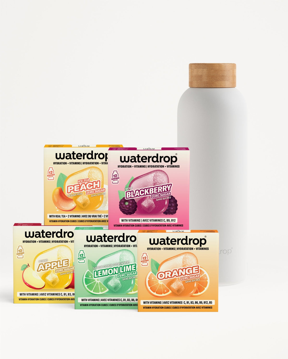 30 Days Starter Set Thermo Steel: Een tafelopstelling met Waterdrop “vitamin hydration cubes” in vijf smaken voor een slanke geïsoleerde fles met houten deksel. Elke doos biedt 12 porties zonder suiker.
