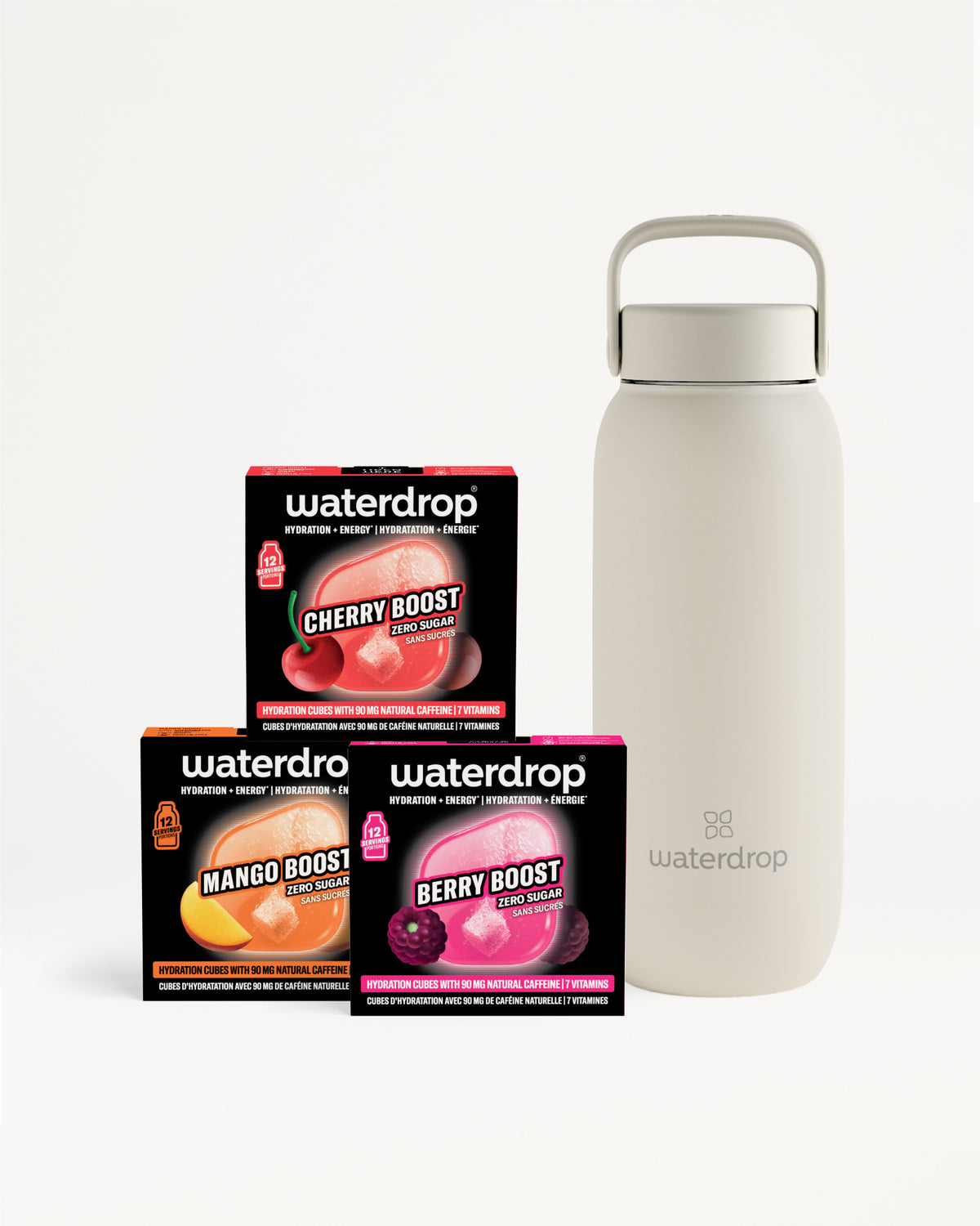 Drie Boost-smaksachets naast een lichtgrijze herbruikbare fles.
