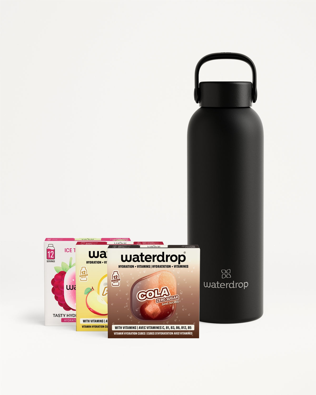 Zwarte geïsoleerde waterfles met handvat naast een set smaakdoosjes.