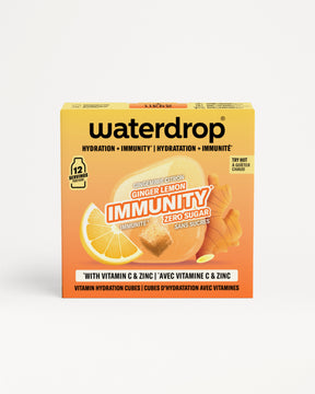 Oranje Waterdrop-immuniteit doos met citroen en gember afbeelding.