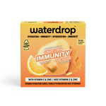 Oranje-geel verpakking van Waterdrop immuniteitscubes met citrusgrafiek.