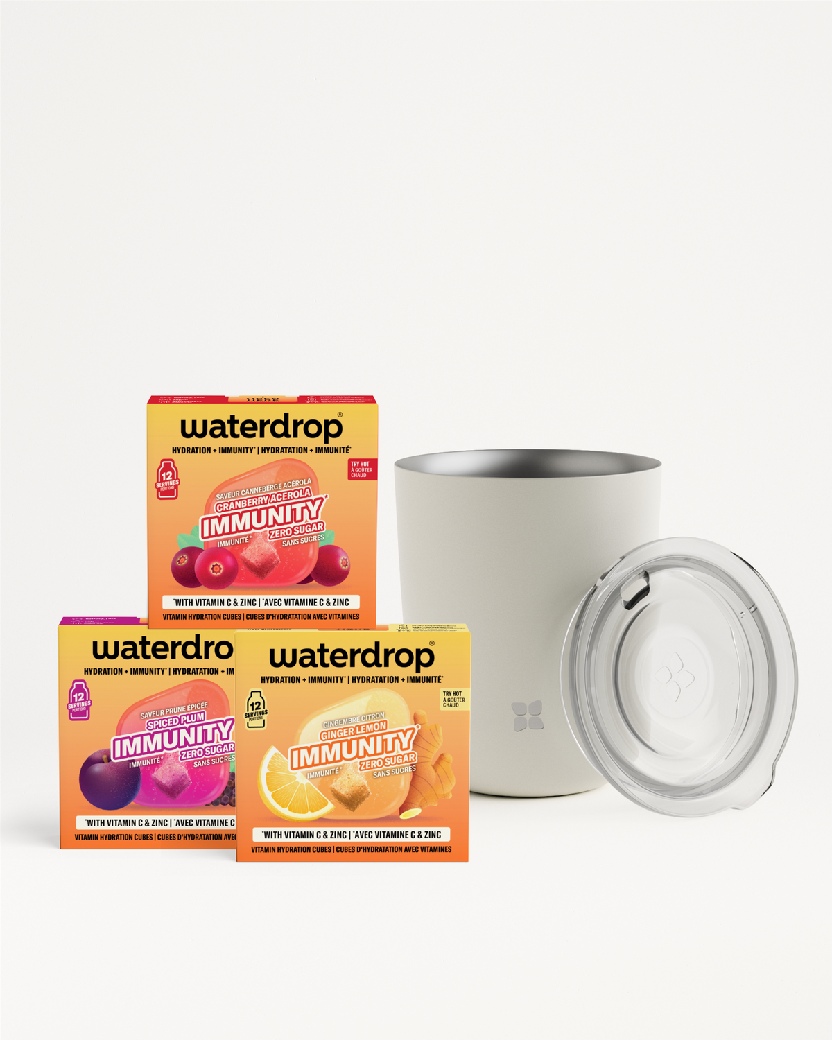 Drie Waterdrop Immunity doosjes met een witte beker en doorzichtig deksel op een lichte achtergrond.