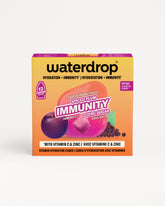Geel-paarse Waterdrop-immuniteitsvitaminenblok doos op witte achtergrond.